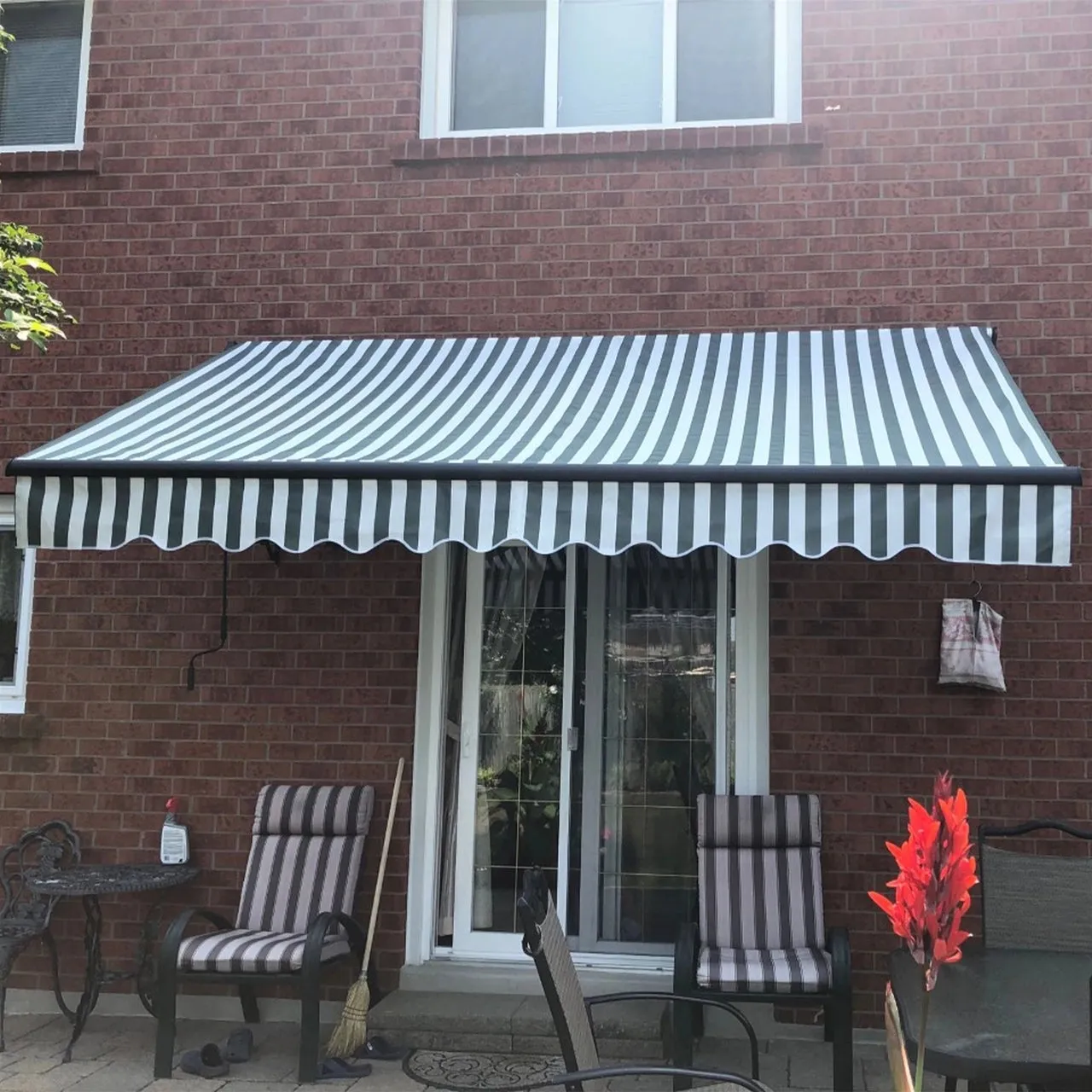Aleko Motorized Retractable Black Frame Patio Awning 16 x 10 Feet - Gray and White Stripes