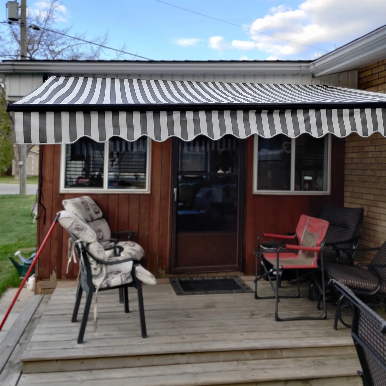 Aleko Motorized Retractable Black Frame Patio Awning 16 x 10 Feet - Gray and White Stripes