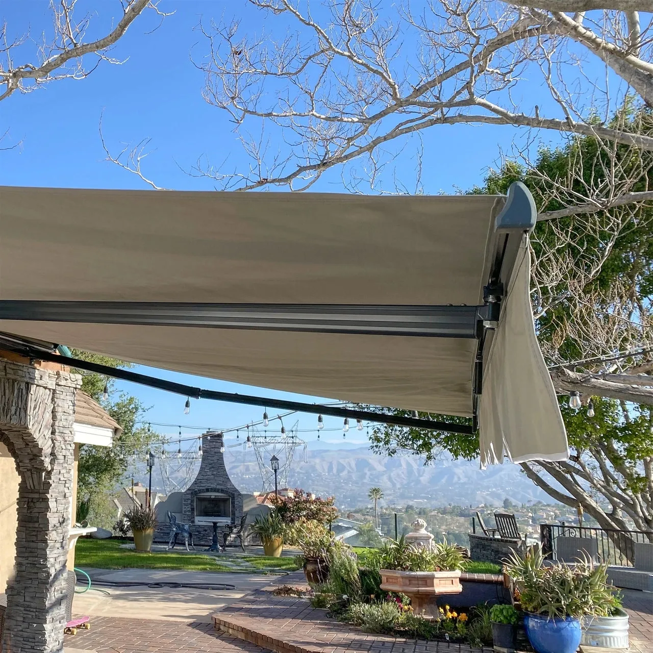 Aleko Motorized Retractable White Frame Patio Awning - 10 x 8 Feet - Ivory
