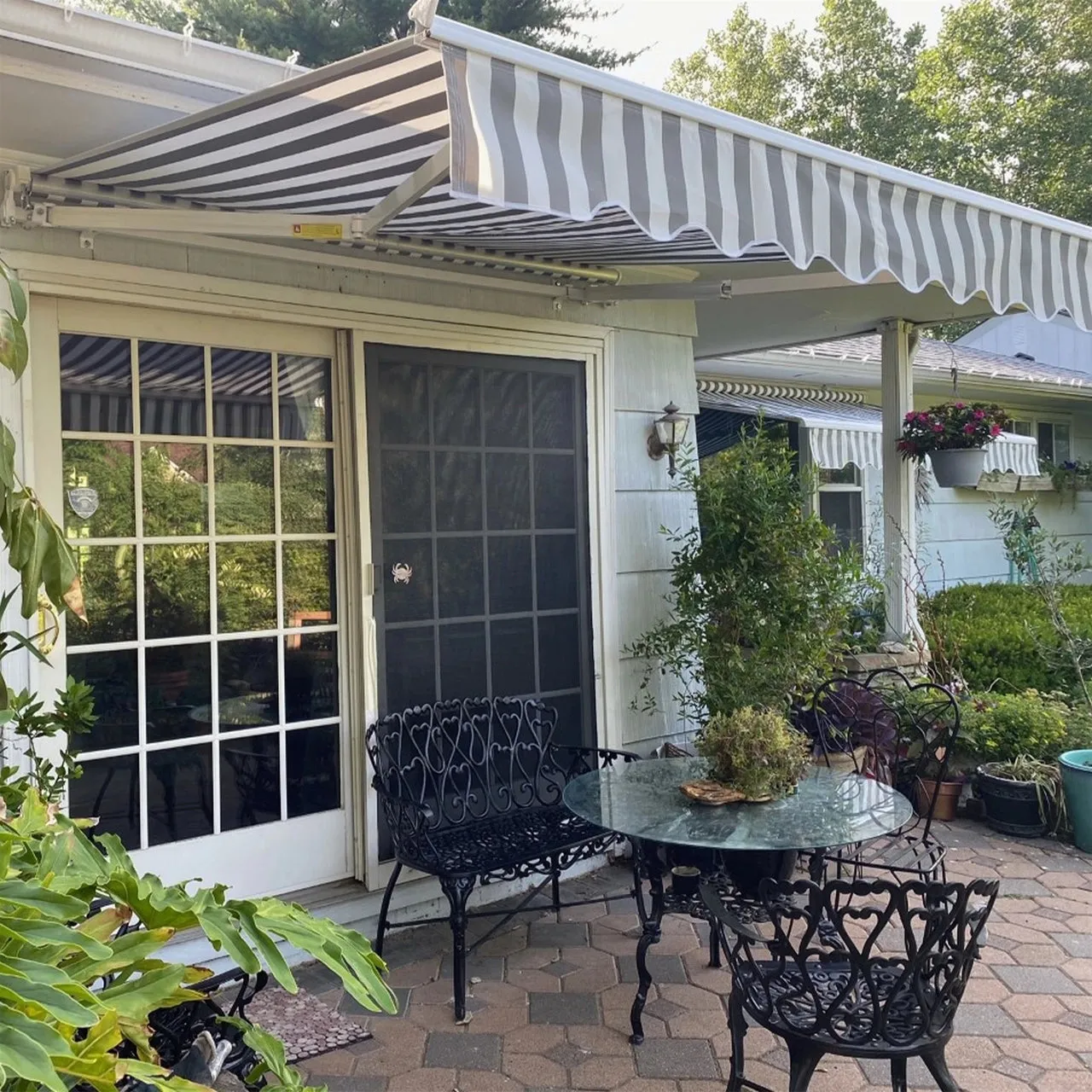 Aleko Retractable White Frame Patio Awning - 13 x 10 Feet - Gray and White Striped